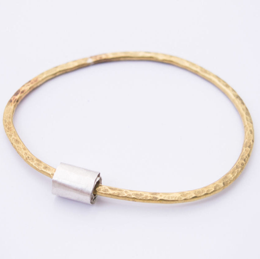 Hammered Brass Bangle with Silver Ripcurl Charm