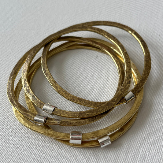 Hammered Brass Bangle with Silver Ripcurl Charm