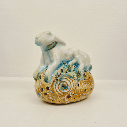 Resting White Hare with Rock SS190